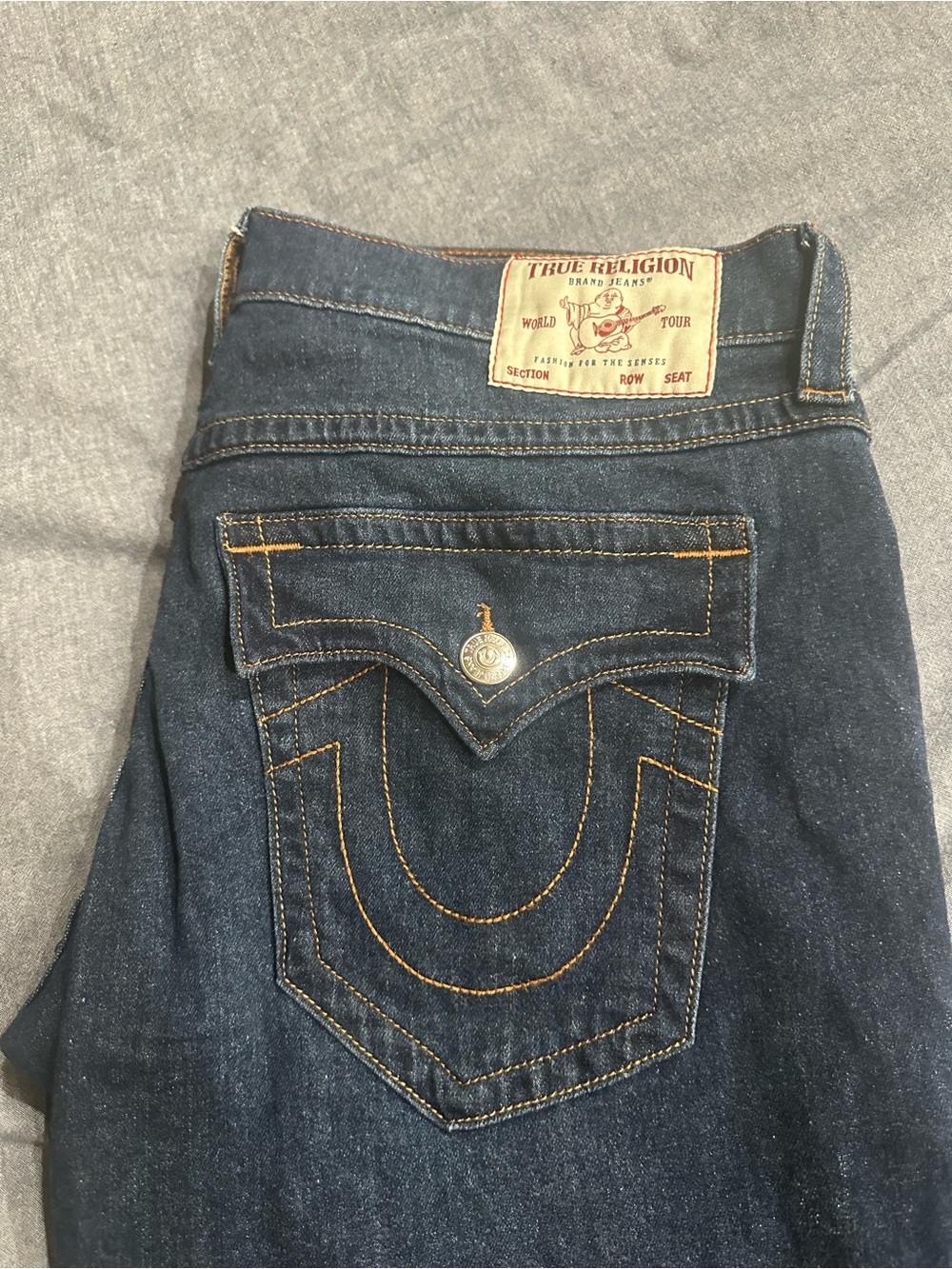 True Religion Men’s Dark Blue Boot Cut Jeans with Signature Pocket Stitch